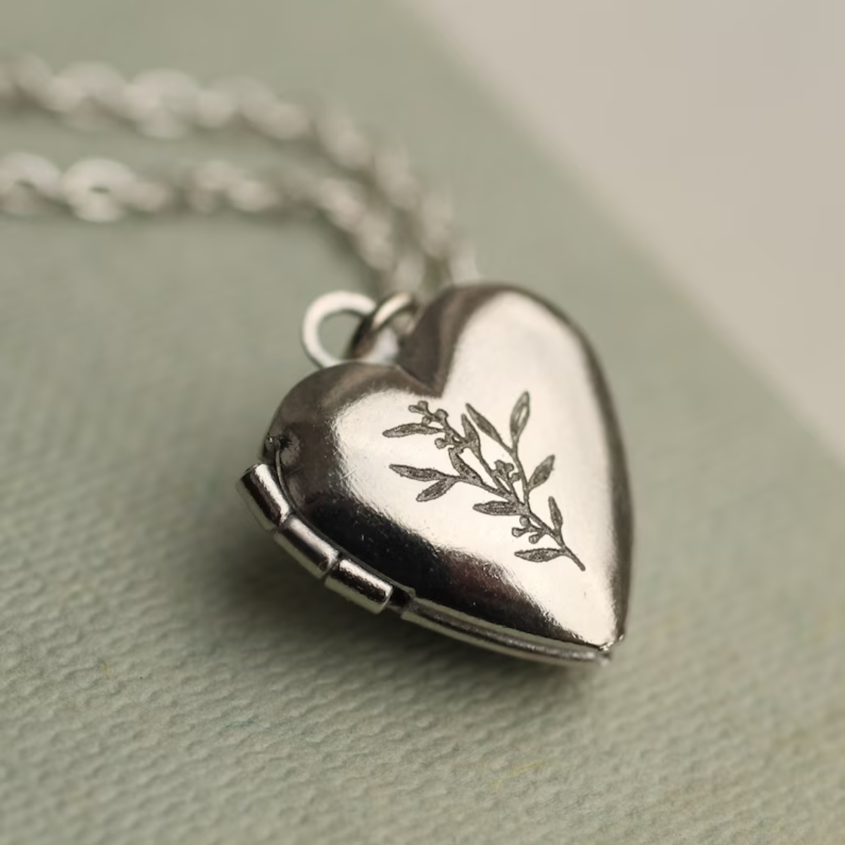 22. Forever Sealed: Engraved Love Locket, the Perfect 7th Anniversary Gift for Your Wife