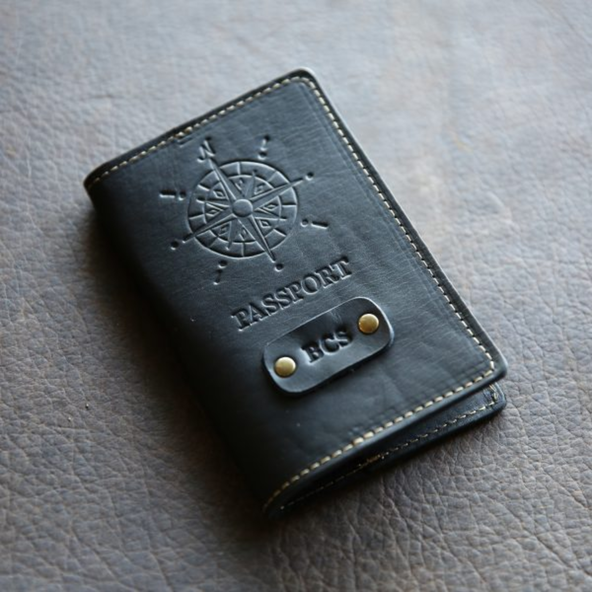 52. Exquisite Iron-Embossed Leather Passport Cover: The Perfect Anniversary Gift for Her