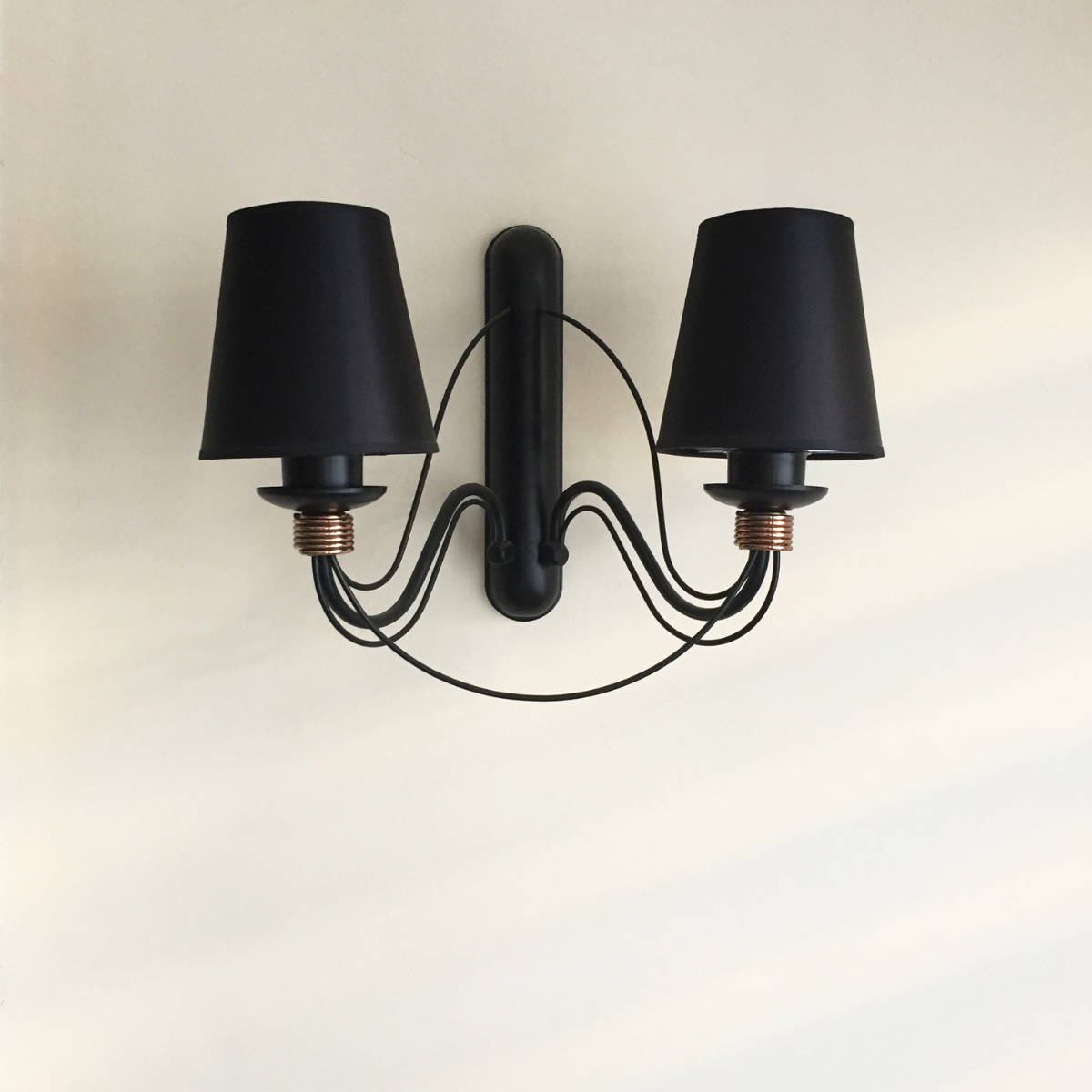 47. Elevate Your Anniversary with Iron-Inspired Wall Sconces: A Unique and Thoughtful Gift Idea