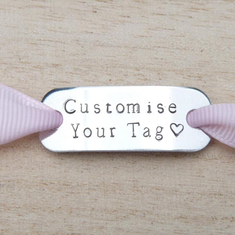 13. Step up your running game with personalized shoe tags for the perfect gift!