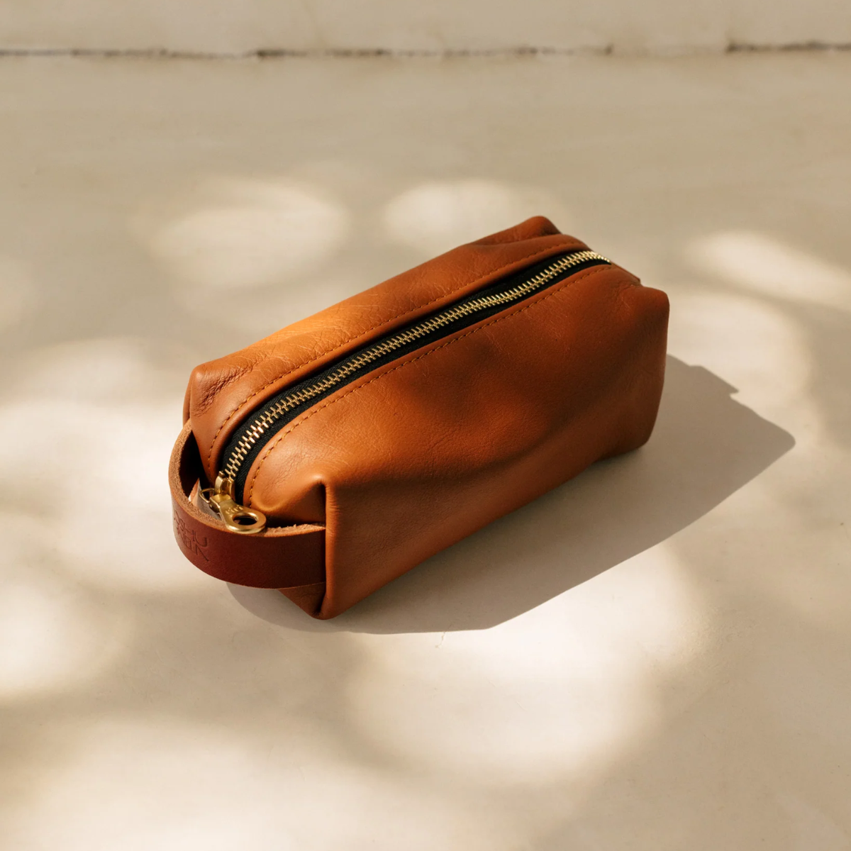 3. Timeless Elegance: Leather Dopp Kit, the Perfect 3rd Anniversary Gift for Him