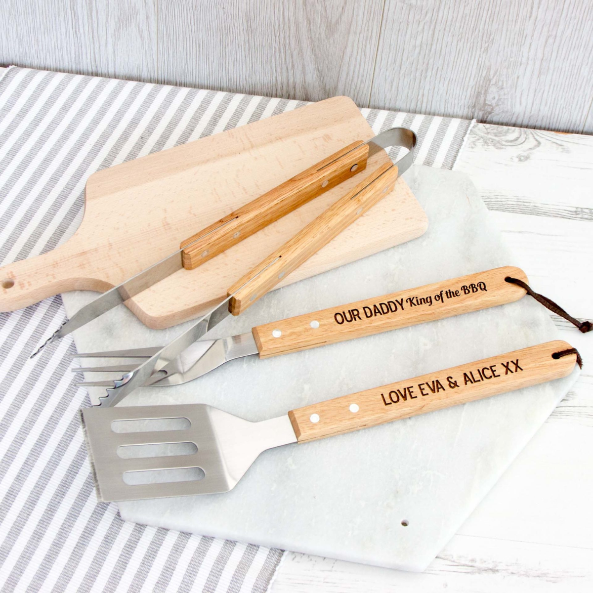 37. Unleash His Grill Master Skills with a Personalized Engraved BBQ Set