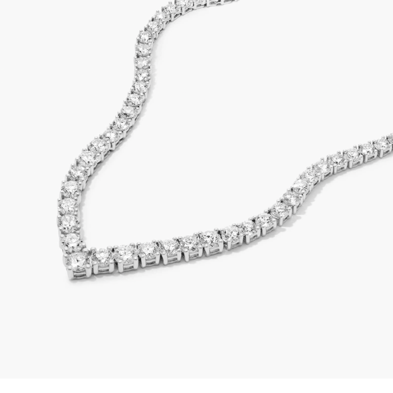 1. Sparkle and celebrate 14 years with a stunning Diamond Halo Necklace!